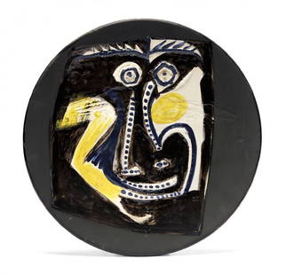 Pablo Picasso: Visage Partially glazed ceramic plate, conceived in 1960 and executed in a numbered edition of 100. Marked 'Madoura Plein Feu, Empreinte Originale de Picasso, 4/100' on the reverse.  Diameter 16.77 i