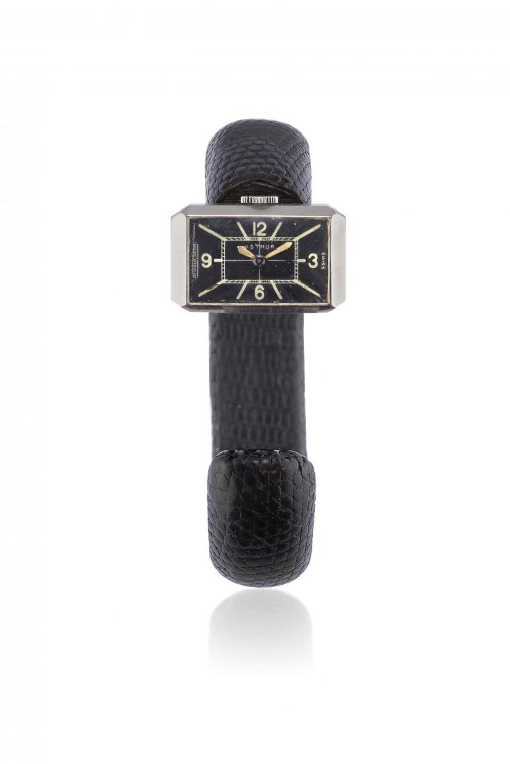 JAEGER-LECOULTRE BRACELET WATCH, 30s: JAEGER-LECOULTRE BRACELET WATCH, 30S Two body rectangular staybrite steel case, n. 42225, inclined edge, snap on back, winding crown at 12 o’clock. Integrated bracelet covered with bla