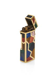 DUNHILL GOLD AND SEMI PRECIUOS STONES LIGHTER: DUNHILL GOLD AND SEMI PRECIUOS STONE LIGHTER 1960-1970S Very unusual 18k yellow gold with multicolored carved semi precious stone lighter. Lapis lazuli, onyx, coral, malachite, pink quartz, mother of