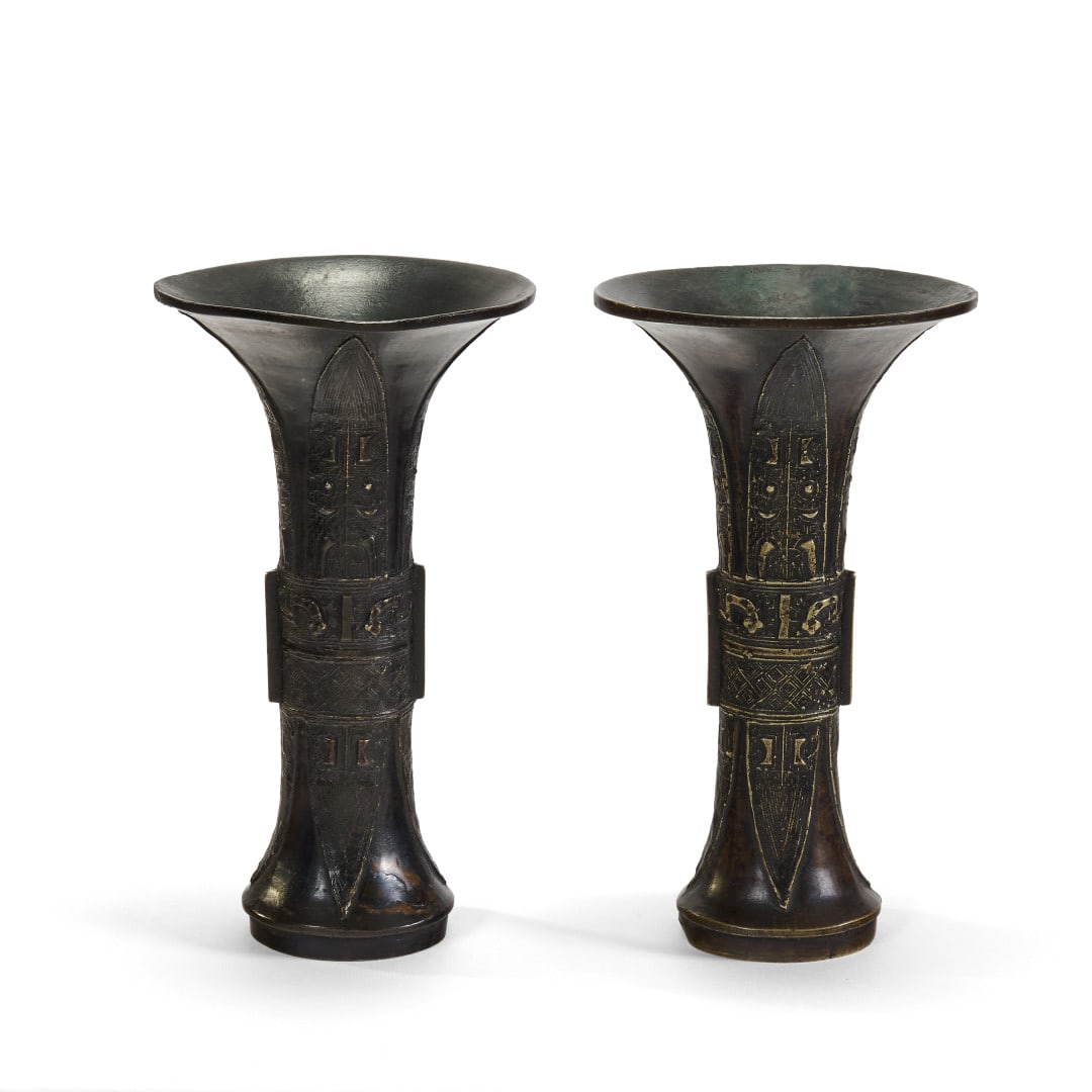 Pair of gu vases China, Qing dynasty: Bronze, archaic style shape and decoration. 7.7 x 4.3 in.