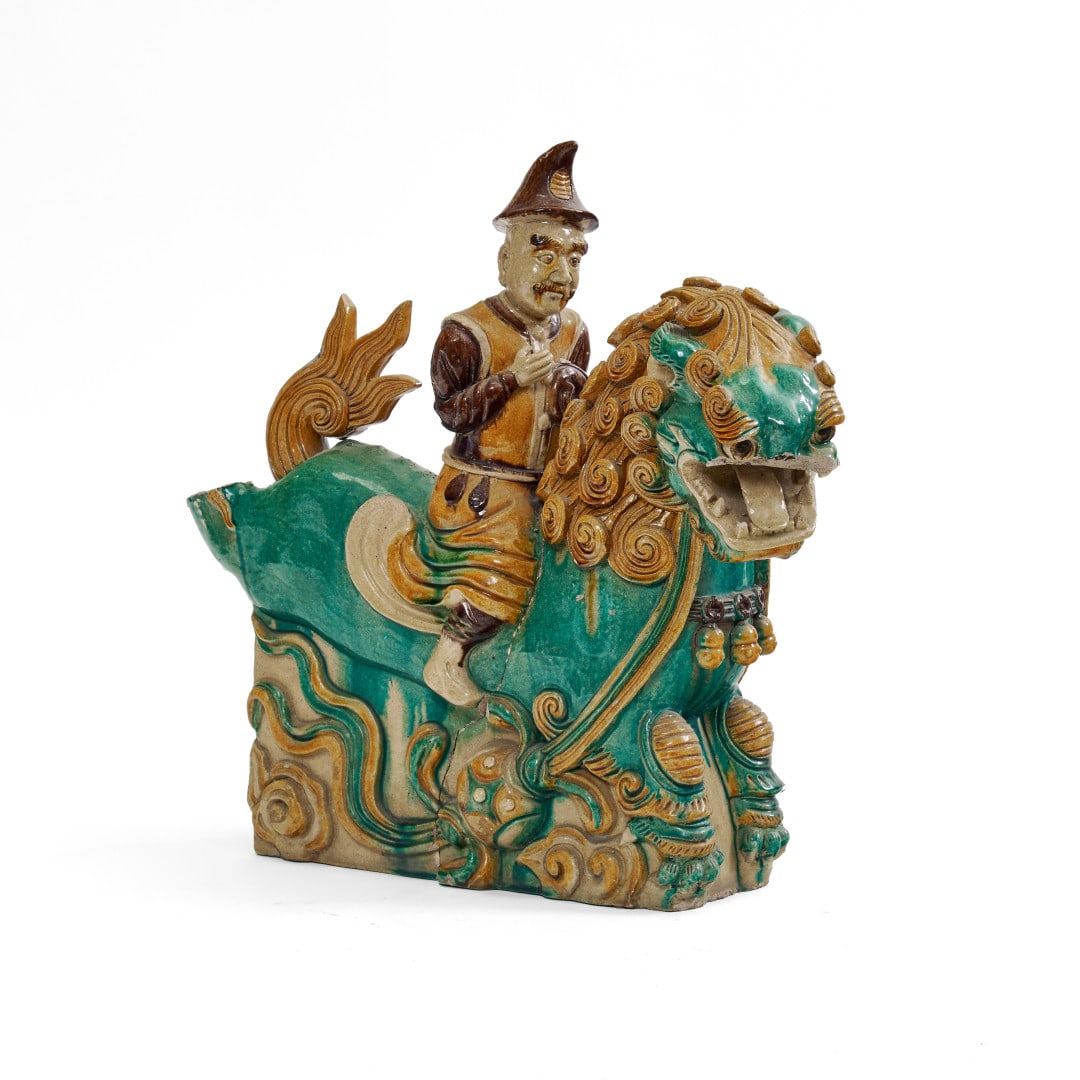 Figure riding a mythological animal China, 20th century: Glazed ceramic. Restorations and defects. 23.6 x 7.1 x 23.6 in.