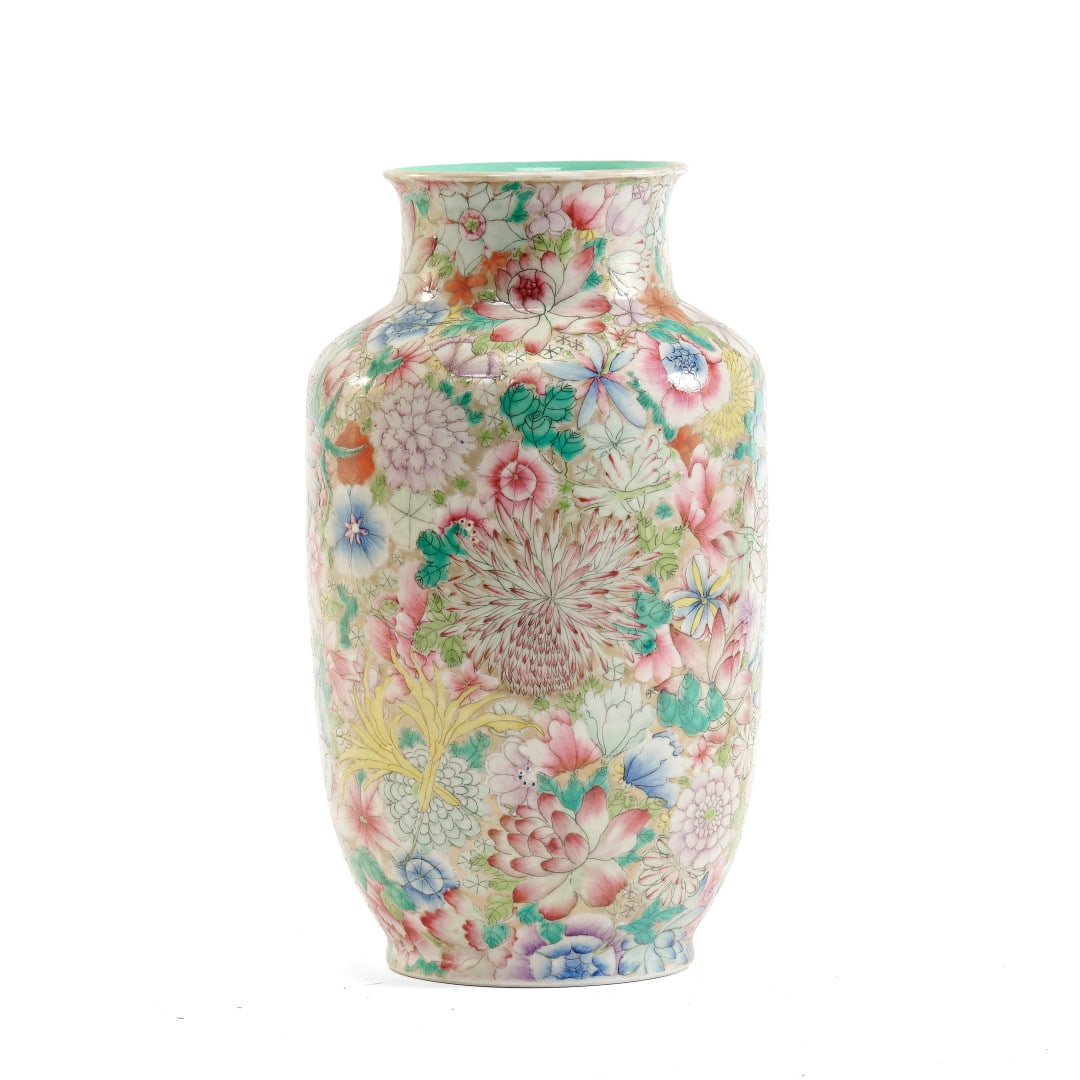 Vase China, 20th century: Porcelain with 'millefleurs' polychrome enamels decoration, apocryphal Qianlong mark to the center of the base. 11.4 x 5.9 in.
