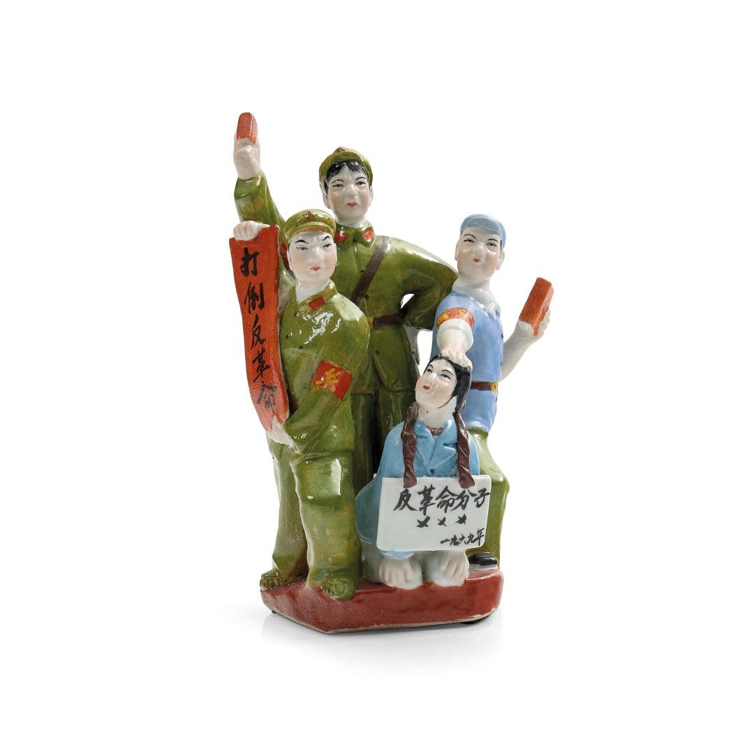Group of figures China, 20th Century: Porcelain decorated with polychrome enamels, an example of a production for propaganda purposes from the Maoist period. Minor defects. 13.2 x 8.7 x 7.1 in.