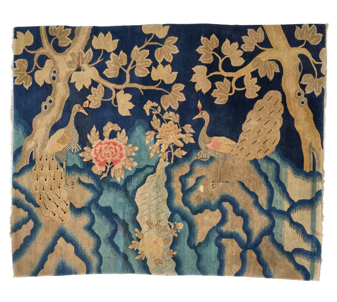 Carpet China, 20th century: Blue and ochre ground, decoration with peacocks and peonies. 73.2 x 94.5 in.