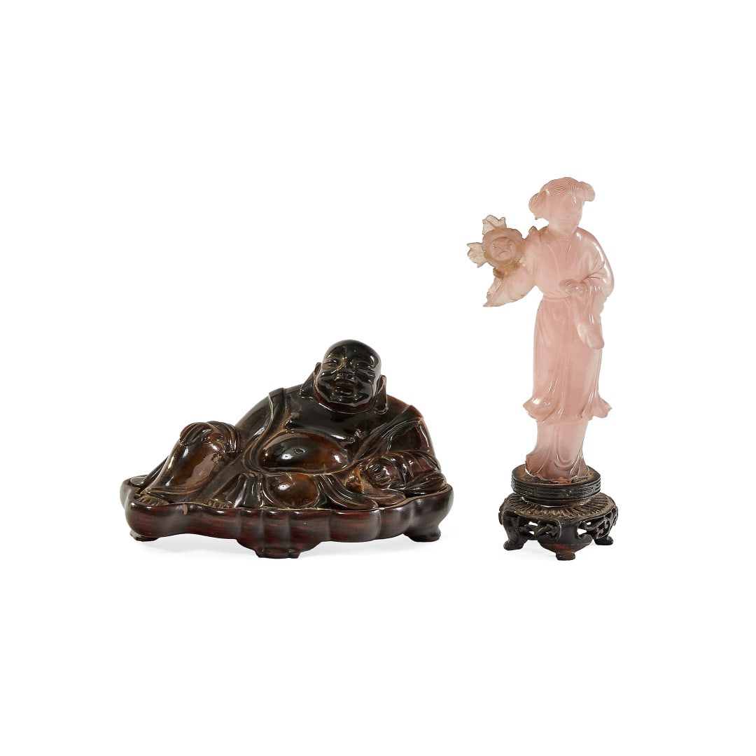 Two carvings China , 20th century: A Budai in tiger's eye and a femal figure in rose quartz, glued wood base. 5.3 x 2 x 1.2 in. the highest