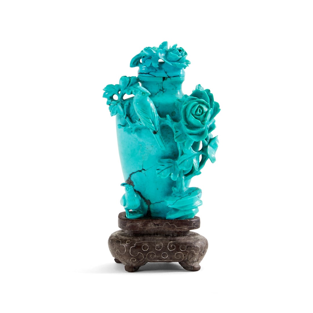 Vase China, 20th Century: Turquoise carved and decorated only on the front with peonies and a pair of bulbul, silver inlaid wooden base. 3.5 x 1.7 x 1.4 in.