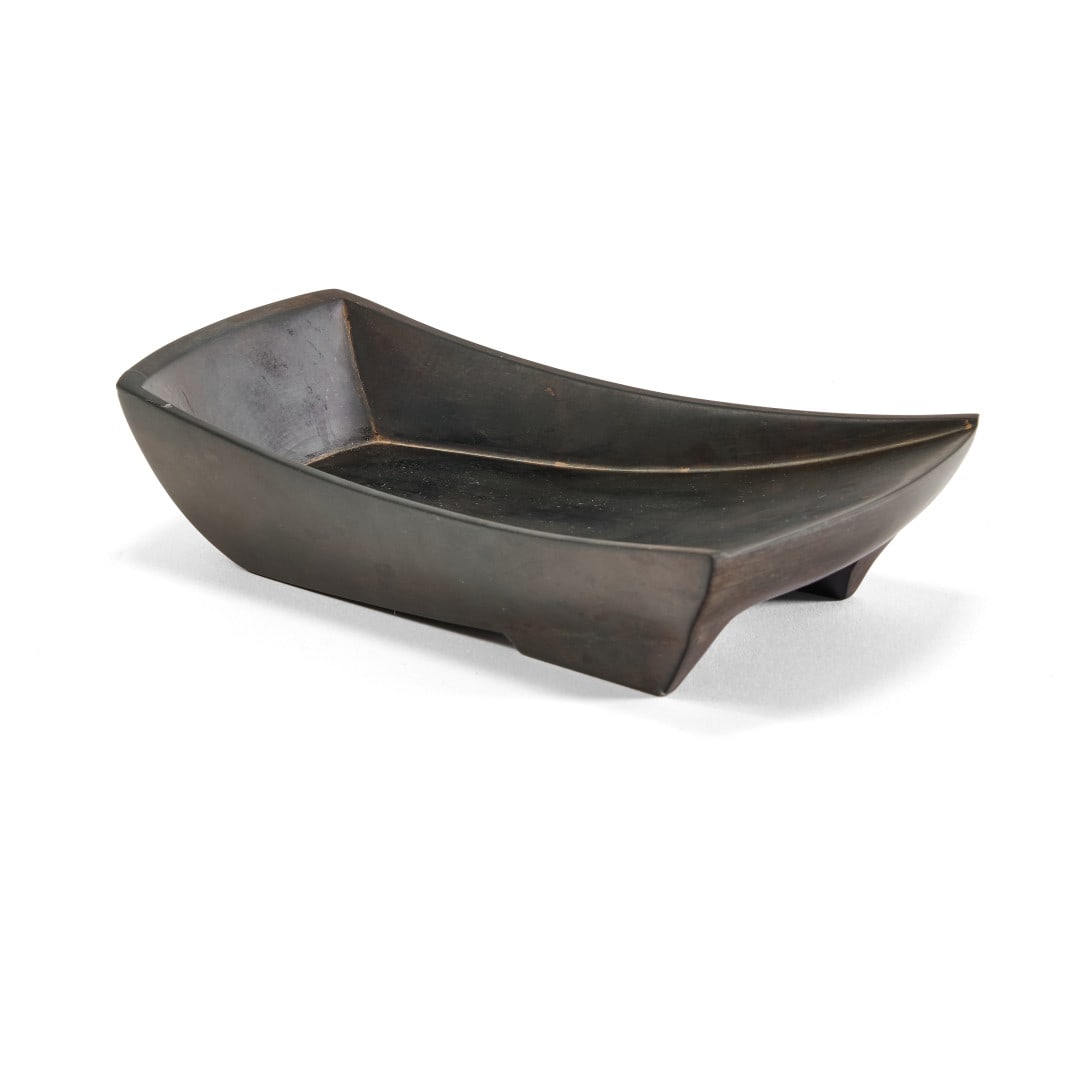 Inkstone China, 20th century: Stone, on a side an inscription. 1.4 x 6.5 x 3.9 in.