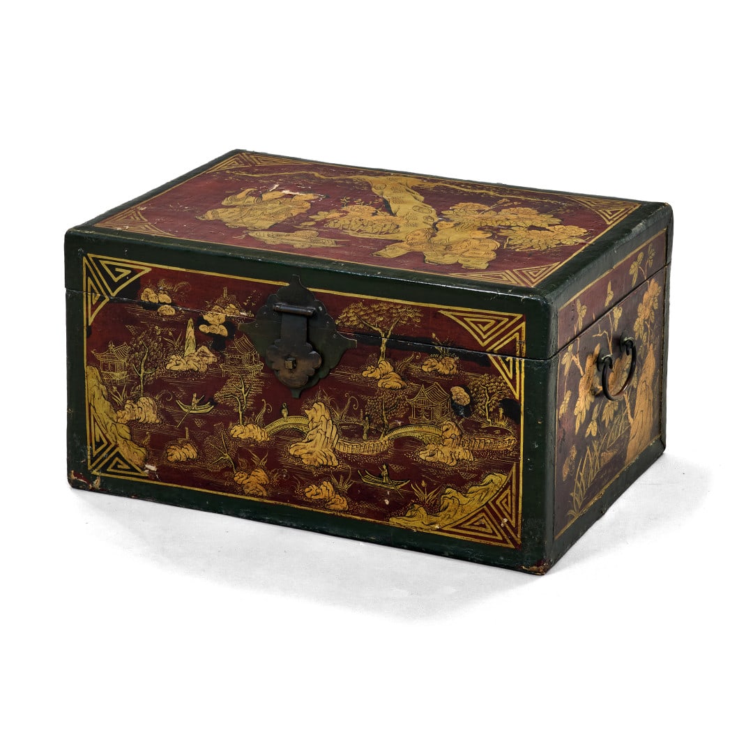 Coffer China, 20th century: Carved, lacquered and gilded wood, metal accessories, decorated with landscapes, figures, flowers and a calligraphic inscription on the back. 15.2 x 29.1 x 20.3 in.