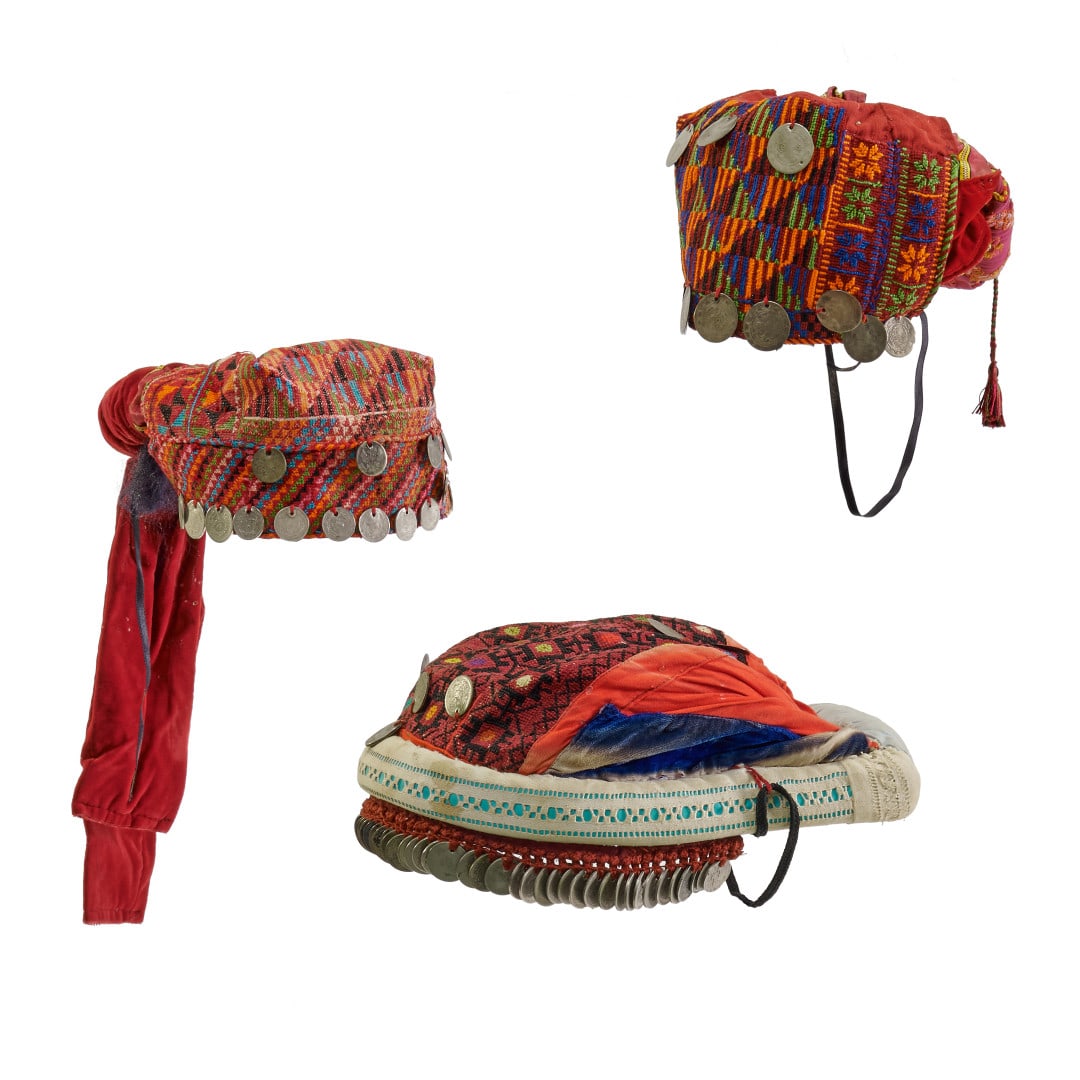 Three hats Afghanistan, 20th century: Fabric and coins. 8.7 x 13 in. the largest