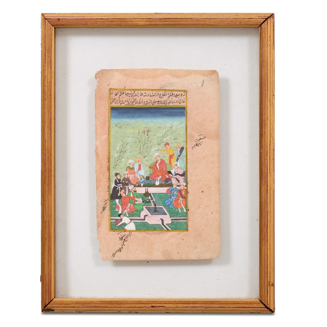 Miniature painting India, 19th-20th century: Colors on paper, the front with a convivial scene in a garden, the back with inscriptions, wooden frame and protective glass. 14.6 x 11.4 in.