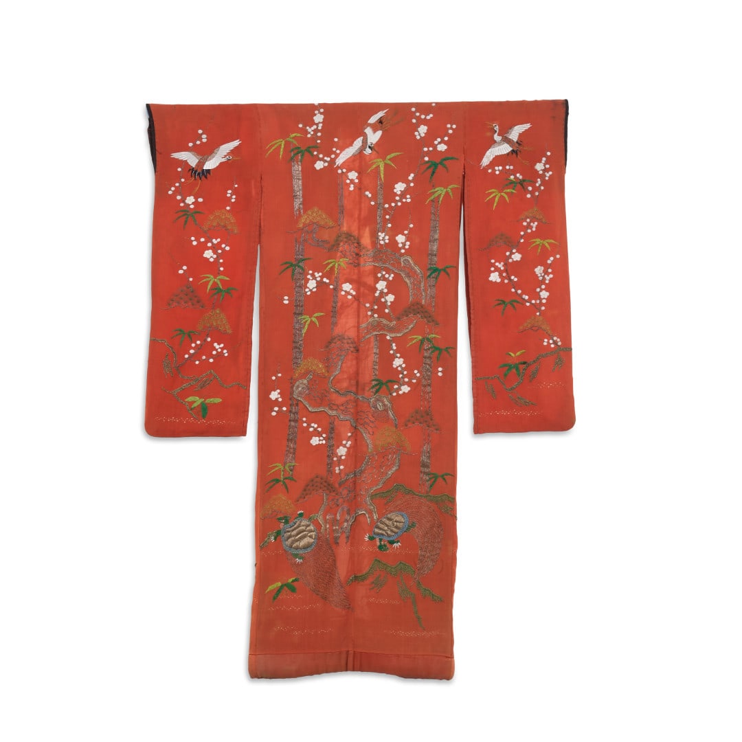 Femalle kimono, furisode Japan, early 20th century: Silk, red ground with embroidered decoration of polychrome threads of pine trees, bamboos, cranes and turtles, all motifs connected with the wish for long life. 67.72 x 49.61 in.