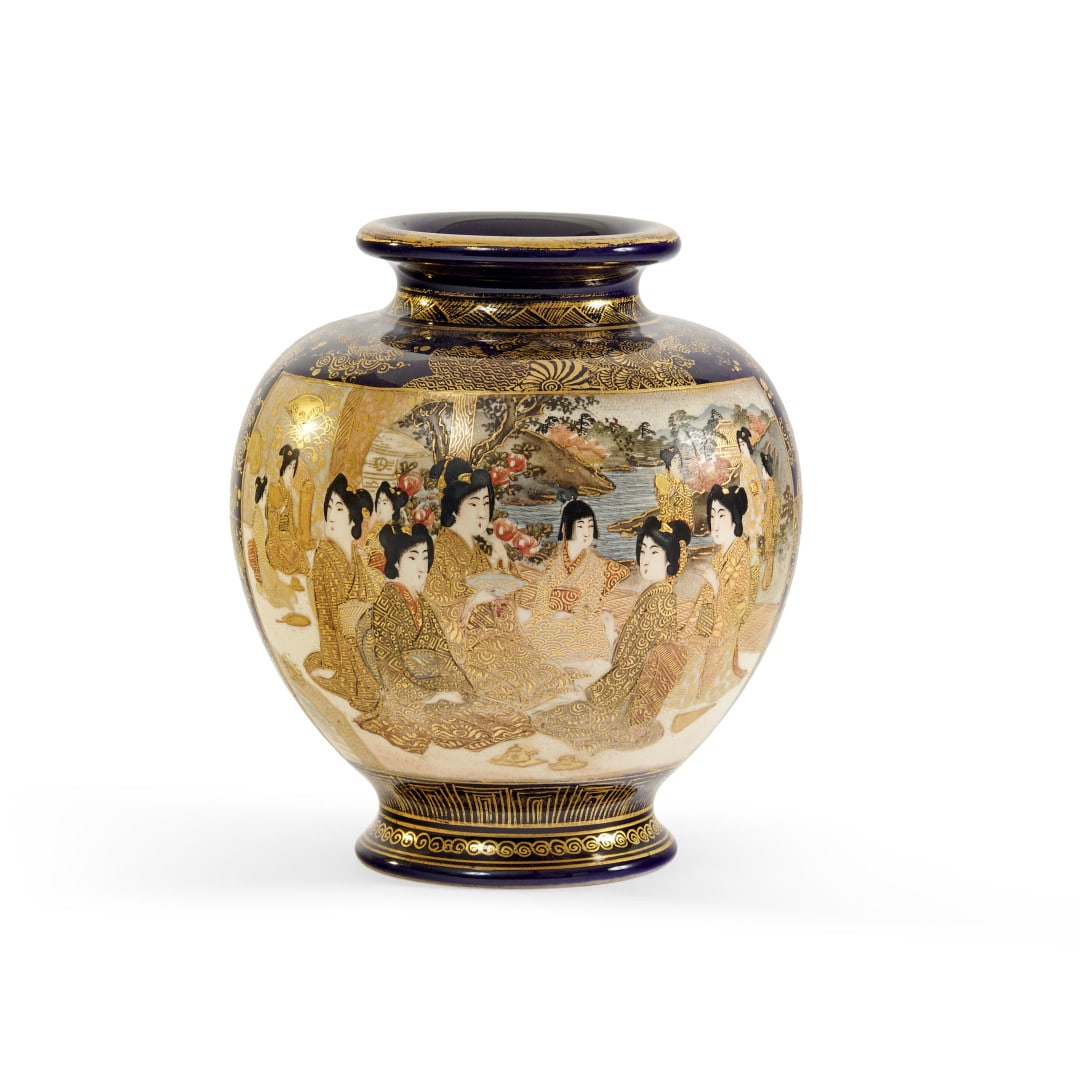 VASE Japan, Meiji period: Satsuma-type ceramic painted with polychrome enamels ang gilding, blue ground , the body with two reserves depicting a landscape with figures, illegible mark to the base. 7.5 x 5.9 x 5.9 in.
