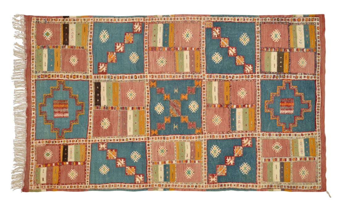 Carpet Northern Africa, 20th century: Polychrome geometric decoration. 110.2 x 63 in.