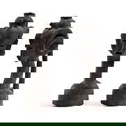 Pair of heads Nigeria, Beni, 20th century: Carved wood. 22.4 x 6.7 x 7.9 in.