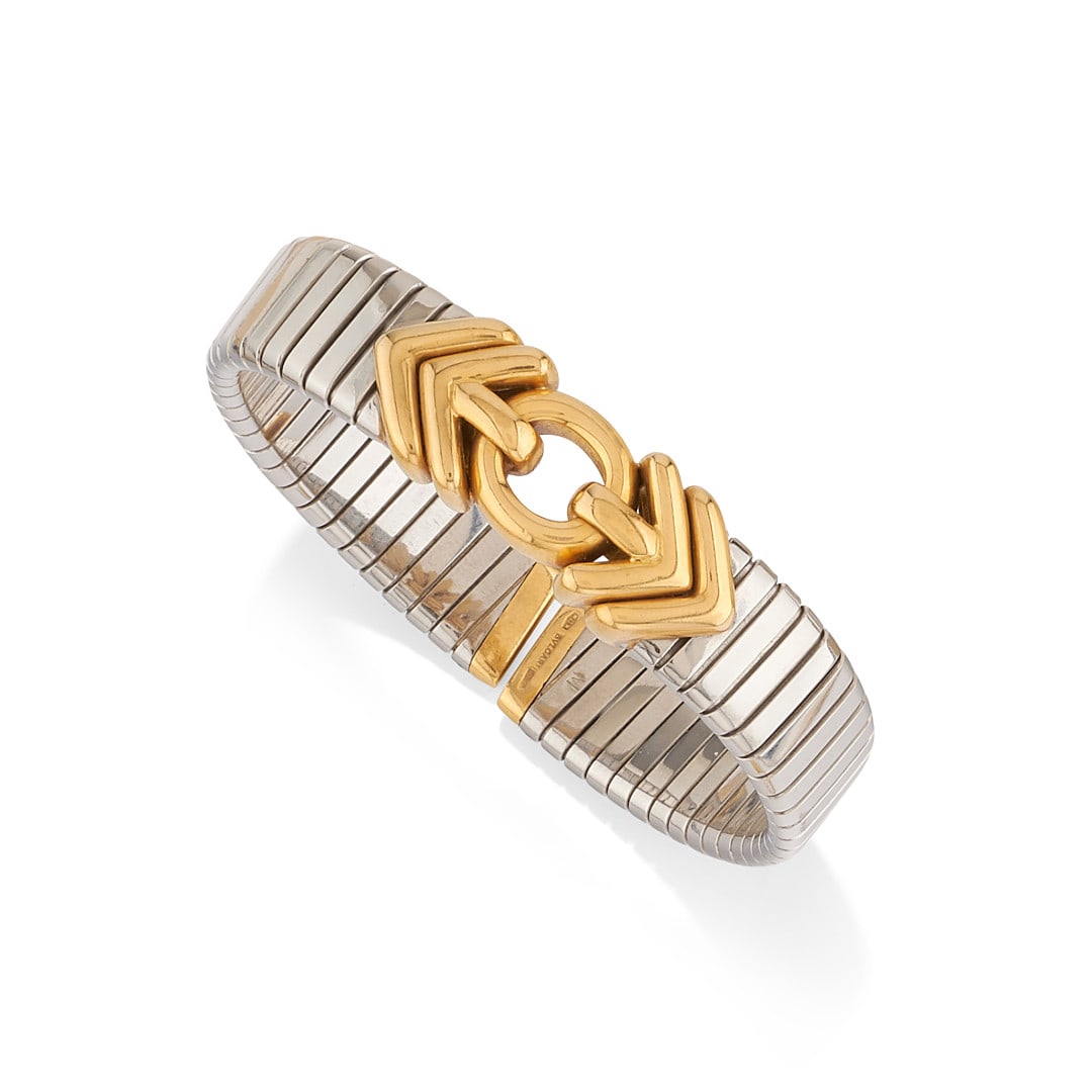 BRACCIALE TUBOGAS, BULGARI - TUBOGAS BRACELET, BULGARI: in acciaio e oro giallo. Firmato Bulgari. Punzone di Bulgari. Gr 45,00 - cm 15,20 x 1,40 - in steel and yellow gold. Signed Bulgari. Maker's mark for Bulgari. Gr 45,00 - cm 15,20 x 1,40