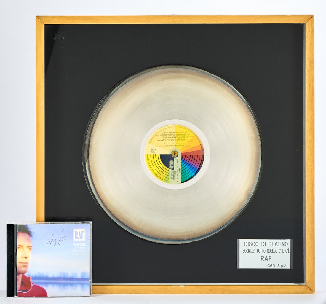 RAF Sogni... E Tutto Quello Che C'è 1991: Platinum award awarded by CGD S.p.A., accompanied by a CD signed on the cover 17.32 x 17.32 in. (2)