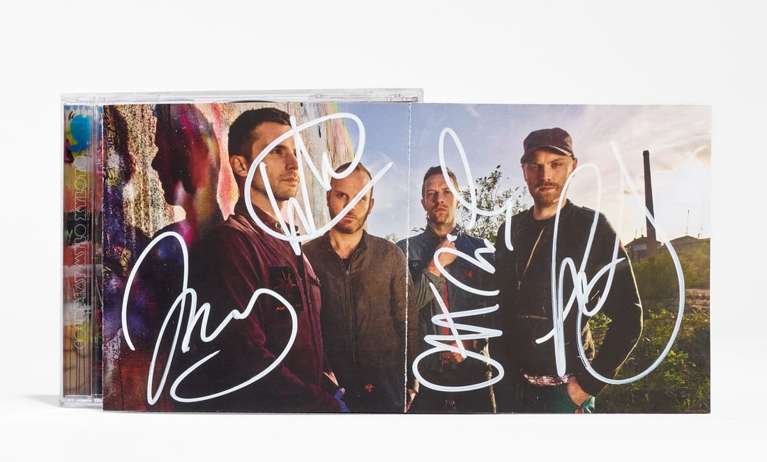 COLDPLAY Mylo Xyloto 2011: Signed CD by all band members on the inner booklet 