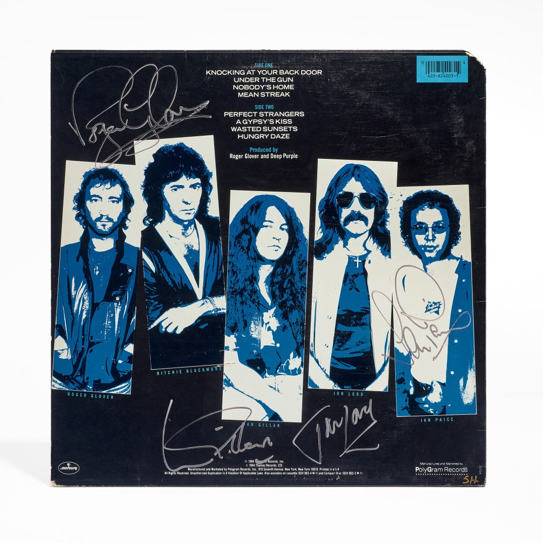 DEEP PURPLE Perfect Strangers 1984: LP including four original concert passes from The House of Blue Light, Perfect Strangers Tour and Slaves and Masters tours from the 1980s and 1990s Cover signed on the back by the band members; the