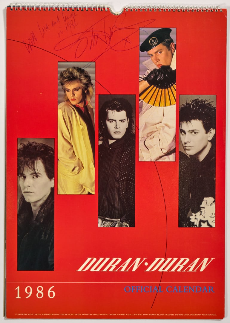 DURAN DURAN Calendar 1986: Official 1986 calendar featuring an autograph signature and personal dedication by Simon Le Bon 16.73 x 11.81 in.