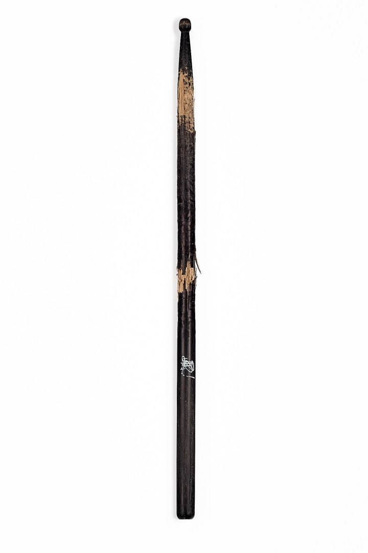 THE ROLLING STONES Original drumstick 2007: Used by Charlie Watts, featuring the artist’s autograph signature 16.14 in.
