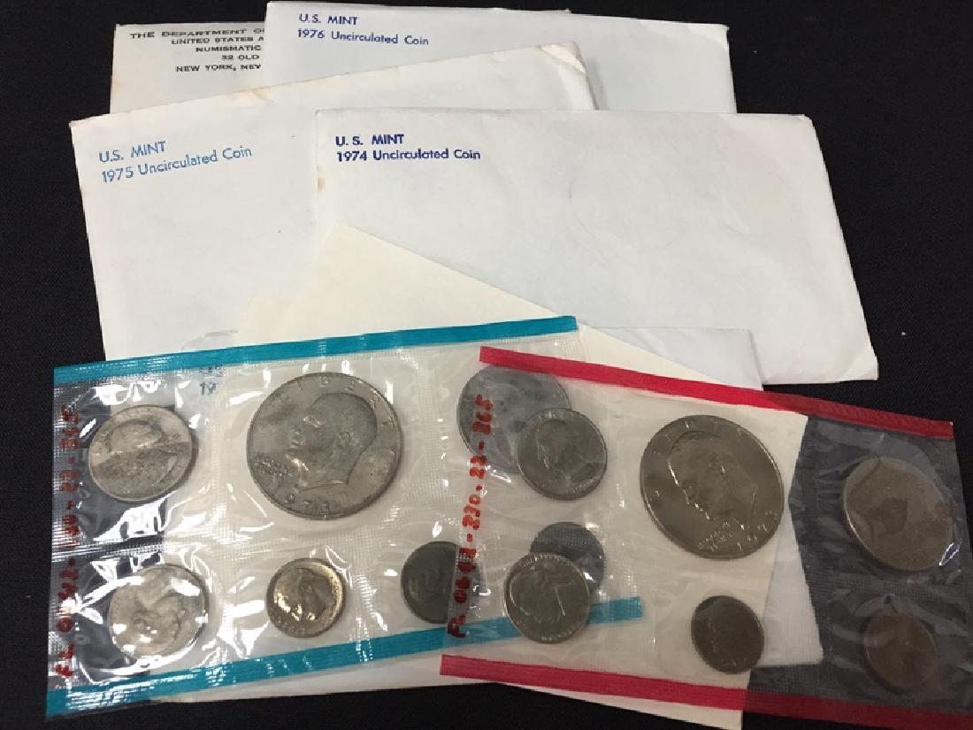 Lot of (12) uncirculated coin sets (1 of 2)