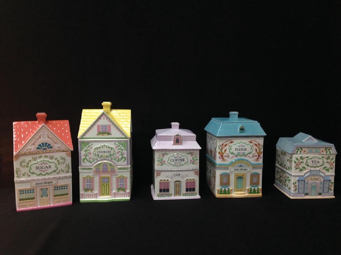 Set (4) LENOX 1990 Canisters plus 1991 Cookie Jar.: This is a very nice Lot of (4) 1990 LENOX VILLAGE Canisters that includes SUGAR, FLOUR, TEA and COFFEE. The lot also includes the LENOX VILLAGE 1991 COOKIE canister. All the pieces are porcelain with