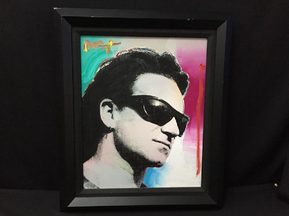 Max, Peter- Bono: Acrylic on Printed Canvas- Signed in paint upper left. Excellent Condition. This a pair of icons, Peter Max and of course Bono! The Irish front man for the legendary rock band U2. The framed measureme