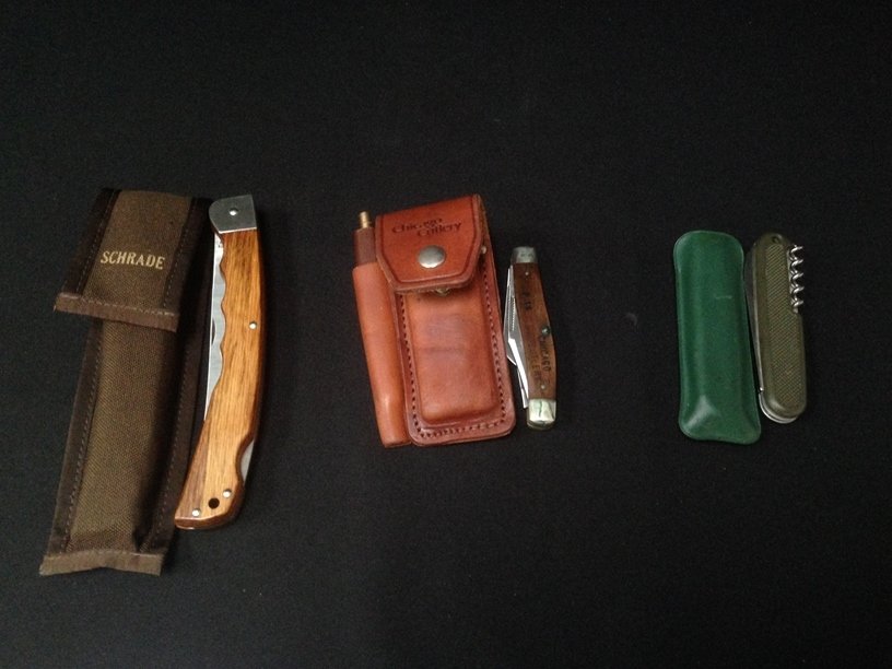 (3) Vintage Folding Knives, Schrade, Victorinox...: This lot contains the following 3 vintage knives; a Chicago cutlery 3 blade folding in leather case with sharpener, a Victorinox 3 blade with corkscrew and a Schrade + Ma6 lock back fillet knife which