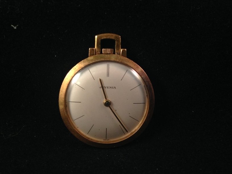 Vintage JUVENIA Gold Plated Pocket Watch.: This vintage JUVENIA slim pocket watch measures about 28mm and is gold plated with 20 microns of gold. The 17 jewel watch is Swiss made and is serial number 598282 on the inside works. The watch is cu