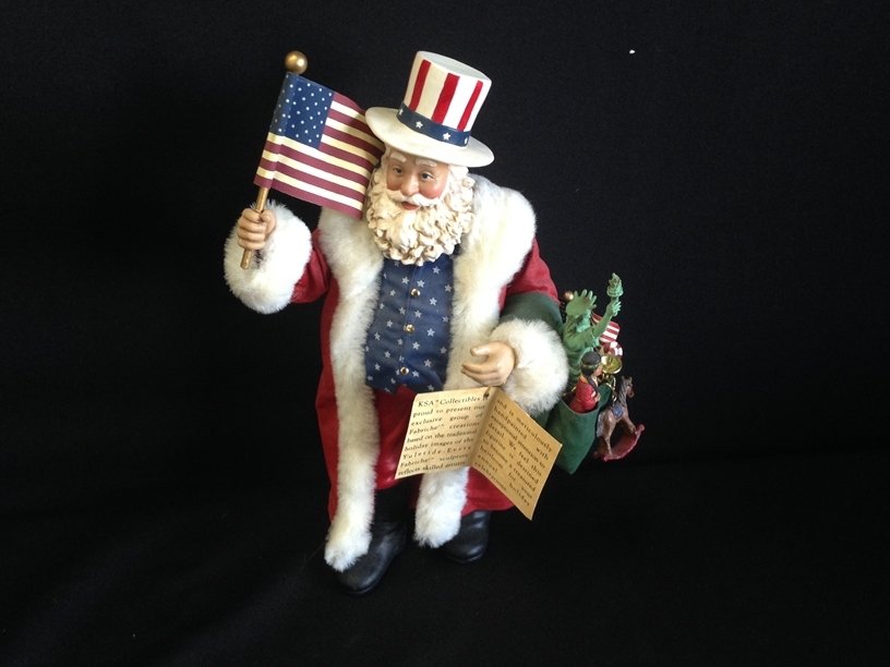 KSA Kurt S Adler American Santa Claus.: KSA Kurt S Adler American Santa Claus. It is approx. 11" Tall with a American Christmas Patriotic theme. Plays nicely when wound.