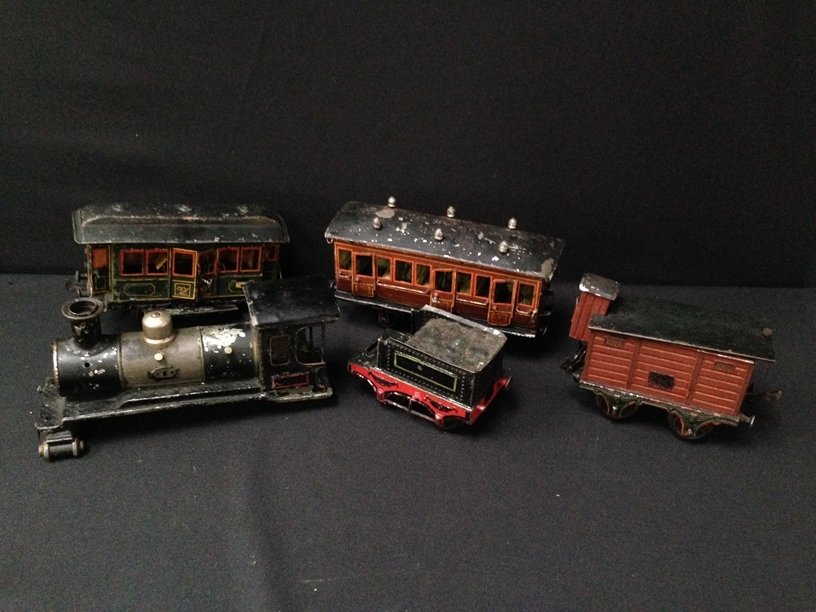 Vintage Pre War Train Set.: Take a look at the photos on this very vintage train set...signs of use visible and some missing wheels.....Good Luck.