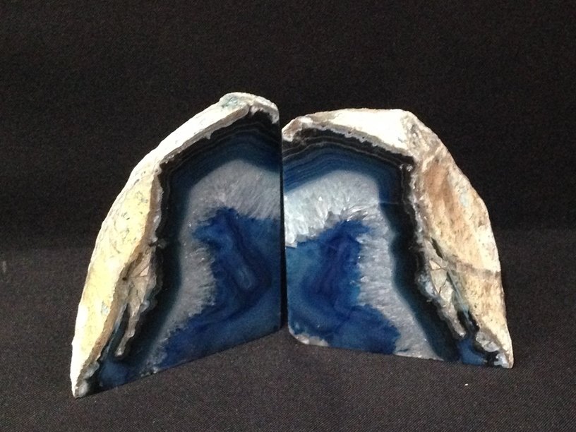 Set of Blue Agate Geode Book Ends.: The brilliantly blue colored Geode Books Ends are approx. 4-1/4" tall and 7" across and 2-1/2" deep.
