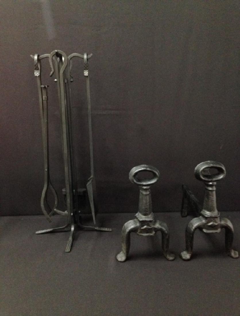 (2) Wrought Iron Andirons (5) Pc. Fireplace Set.: These black wrought Iron Andirons and the (5) piece Fireplace Tool Set are functional and look great. The andirons are about 13" high x 15-1/2" long. The Fireplace tool set includes the 27-1/2" tall s