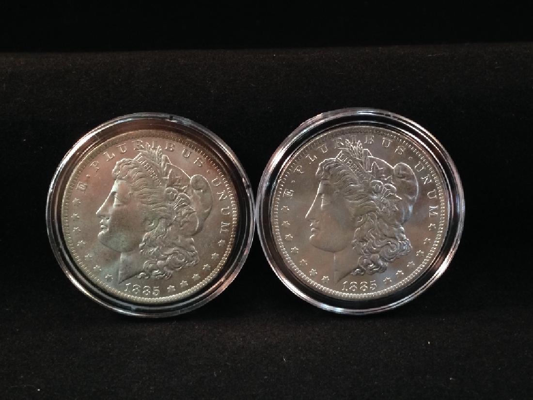 (2) 1885 O Morgan Silver Dollars- Outstanding: One to keep and one to trade, this is a phenomenal pair of New Orleans minted coins. Just look at that detail...both coins are in a protective plastic holder...see pics...Good Luck!!!