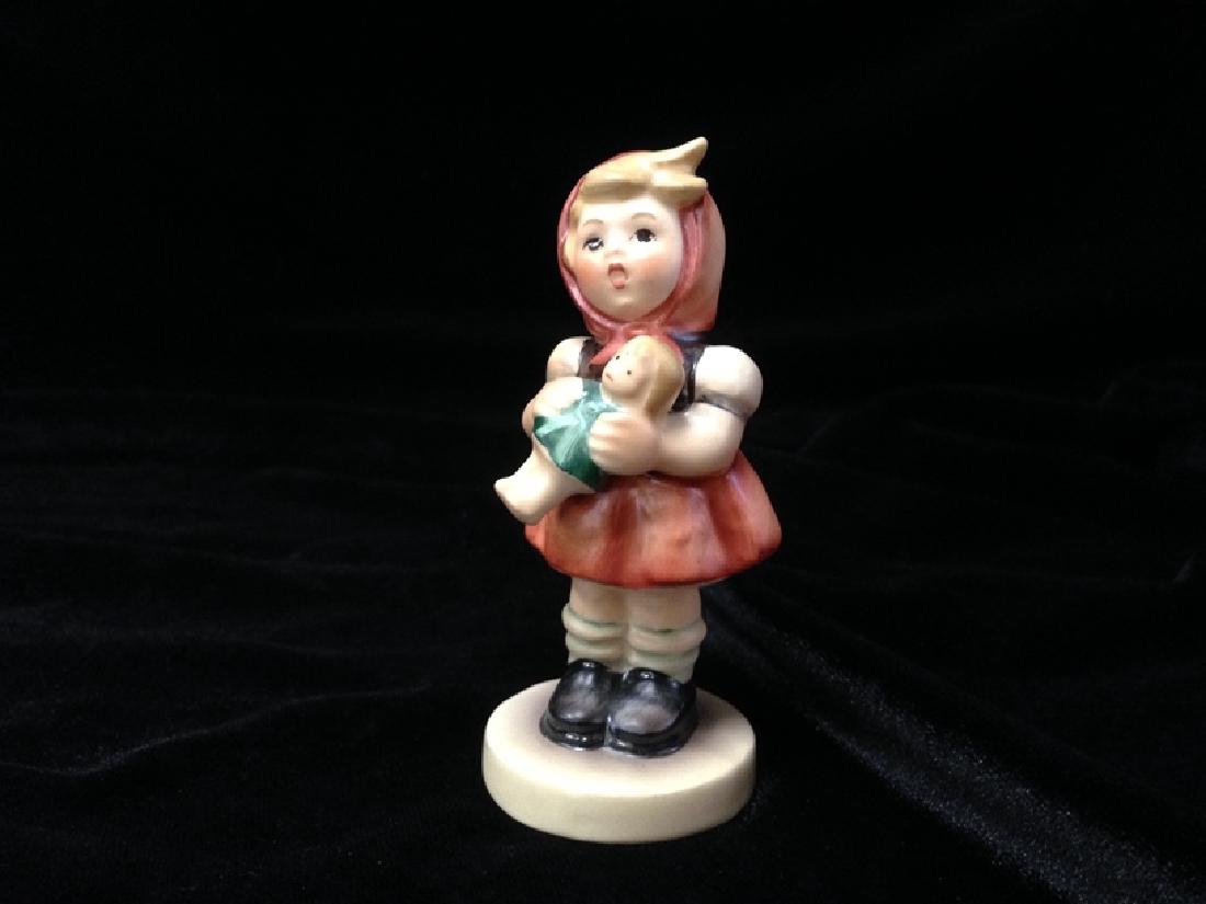Hummel Figurine 'GIRL with DOLL' TMK-4.: This vintage Hummel figurine is #239/B and is titled 'Girl with Doll'. She stands about 3-1/4" tall and is stamped with the trademark for TMK-4 The Three Line Mark (1960-1972). The figurine is in nice