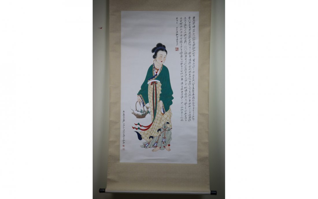 Chinese Scroll Painting: Chinese scroll painting, ink and color on paper, signed Zhang Da Qian (1899-1983); depicting beauty wearing an robe; the right hand holding an basket with a fish; the right with poem and seal; L: 120 