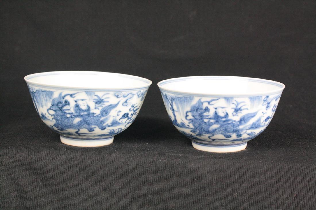 Chinese Blue and White Porcelain Bowl: A pair of Chinese blue and white porcelain bowl; painted with boy riding on a qilong; six character Chenghua mark on base; H: 5 cm, D: 10 cm
