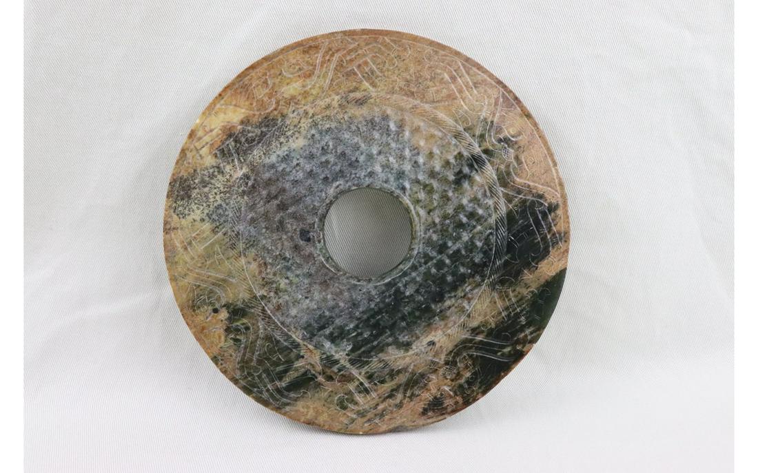 AN ANCIENT JADE DISC (1 of 2)