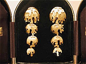 Andrew Grima Freeform Gold & Diamond Earclips: These unique 1960's eighteen-karat earrings by Grima are in a freeform gold design and feature eleven diamonds at .33ctw. The earrings are reversible earclips and measure approximately 3 inches in len