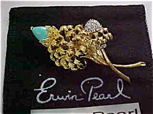 Diamond Turquoise Flower Pin: This pin was designed by the famous Harry Winston designer ERWIN PEARL. Mr. Pearl's fine jewelry designs have become collectors items since he has ceased to make precious jewelery and had become the m