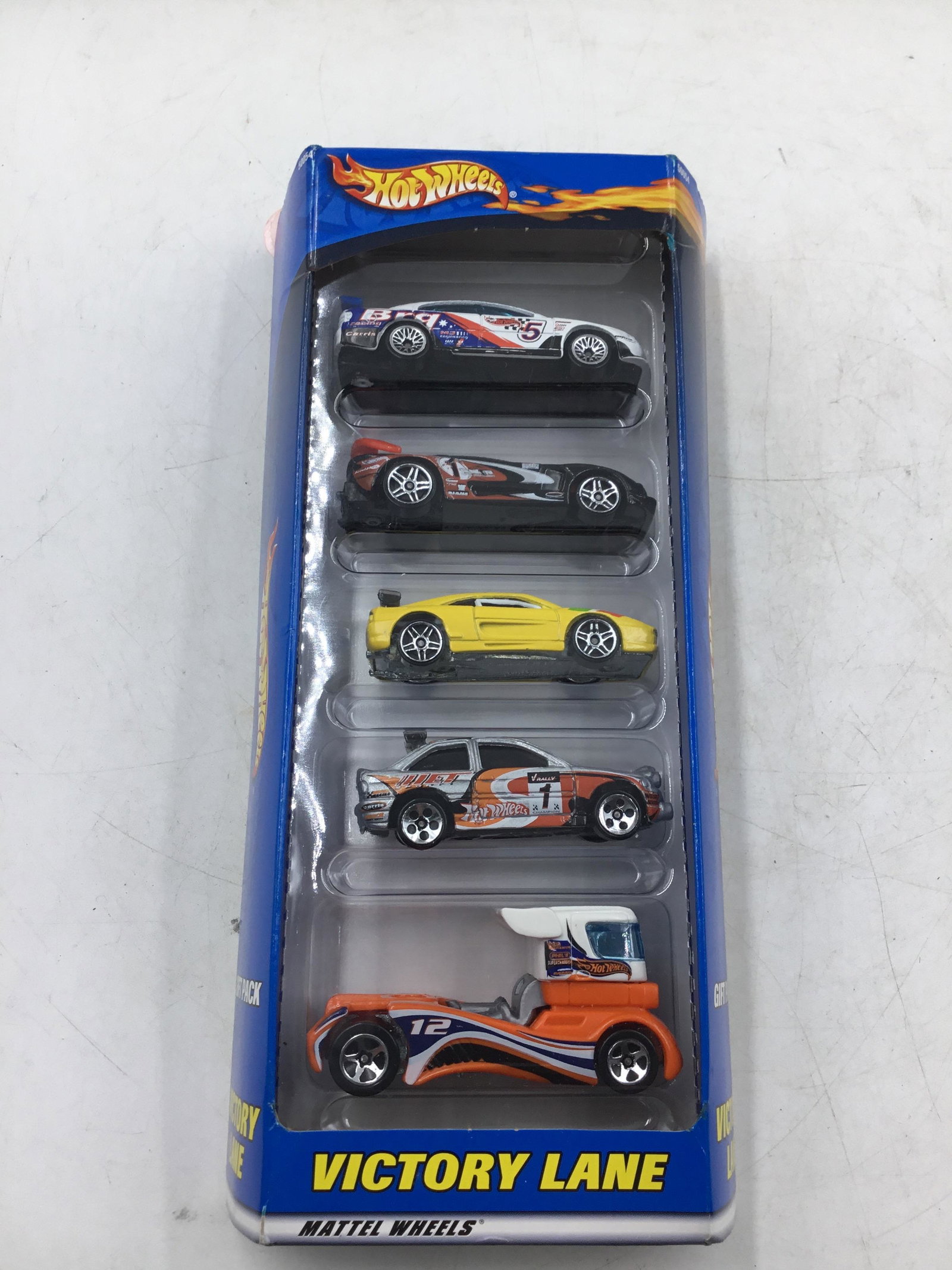 2001 Hot Wheels #50054 Victory Lane Set: 2001 Hot Wheels #50054 Victory Lane Set includes Holden, Callaway C-7, Ferrari F355 Challenge, Escort Rally, and Semi Fast