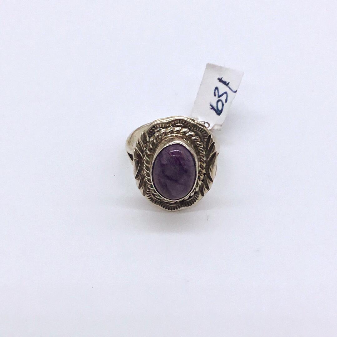 Native American silver ring with Charoite: Native American handcrafted silver ring with Charoite stone and stamped by the artist Daniel Martinez Navajo sterling is size 9 and weighs 7.6 grams #22048