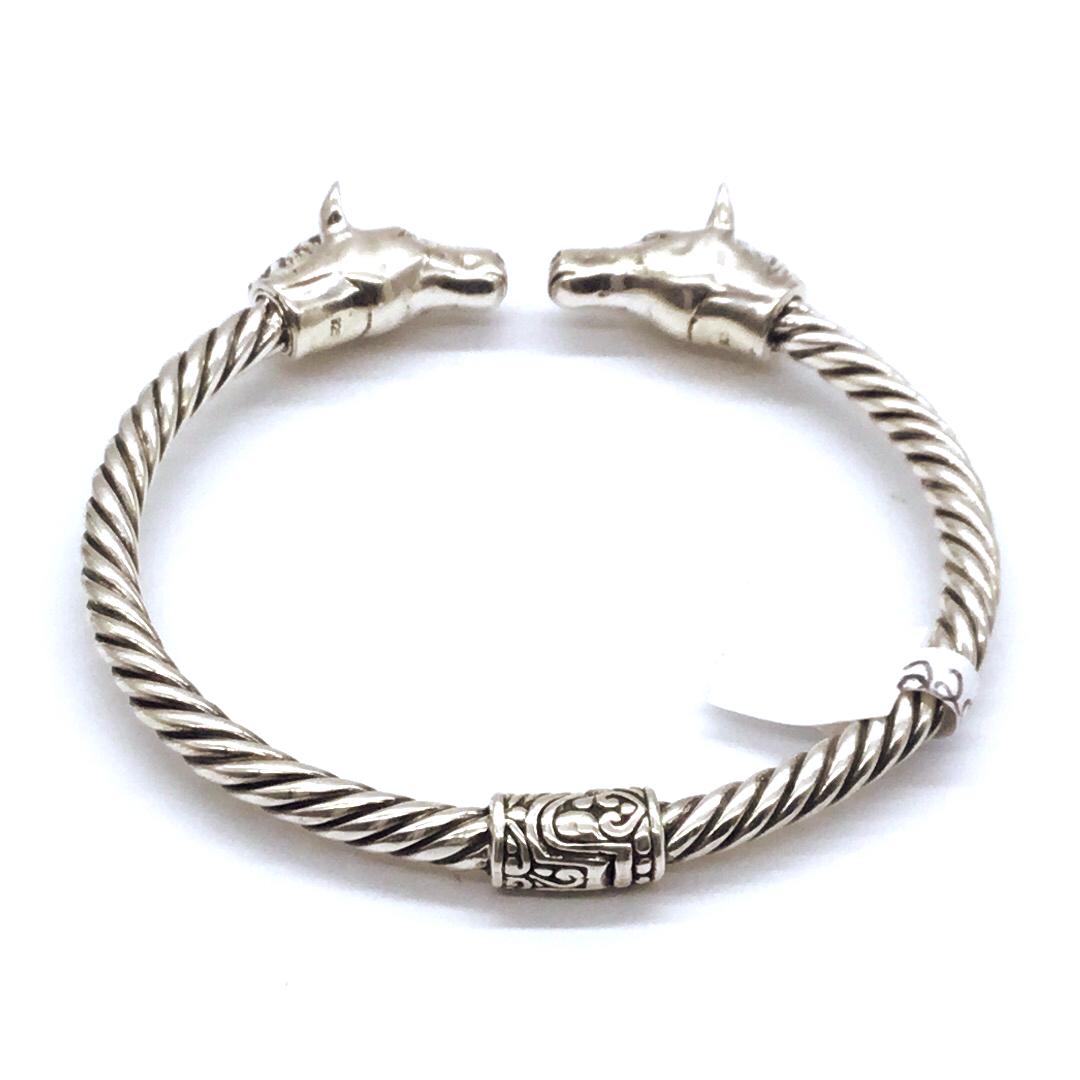 Silver rope hinged bracelet with horse head ends (1 of 3)