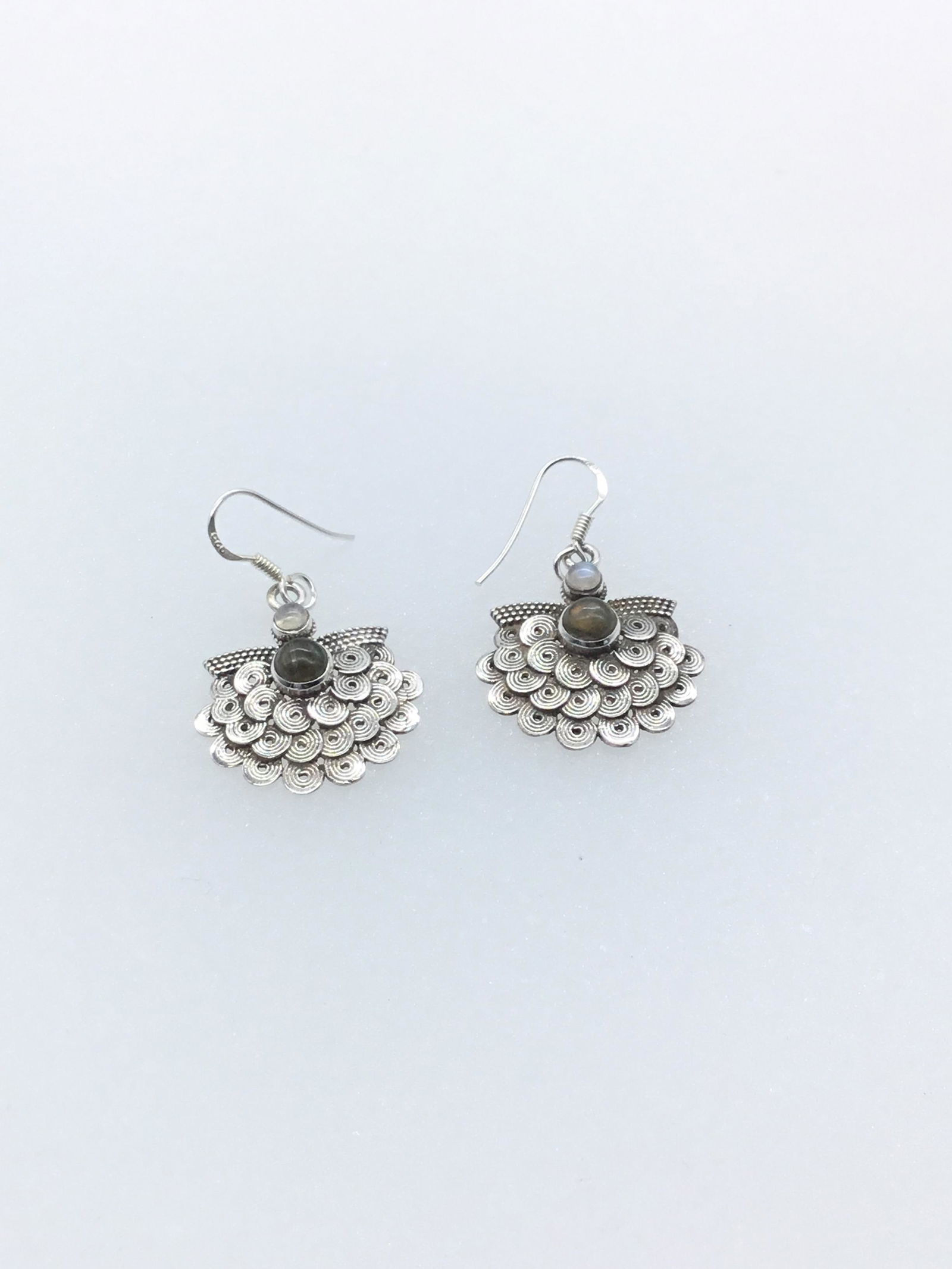 Silver swirl design dangle earrings with moonstone (1 of 2)