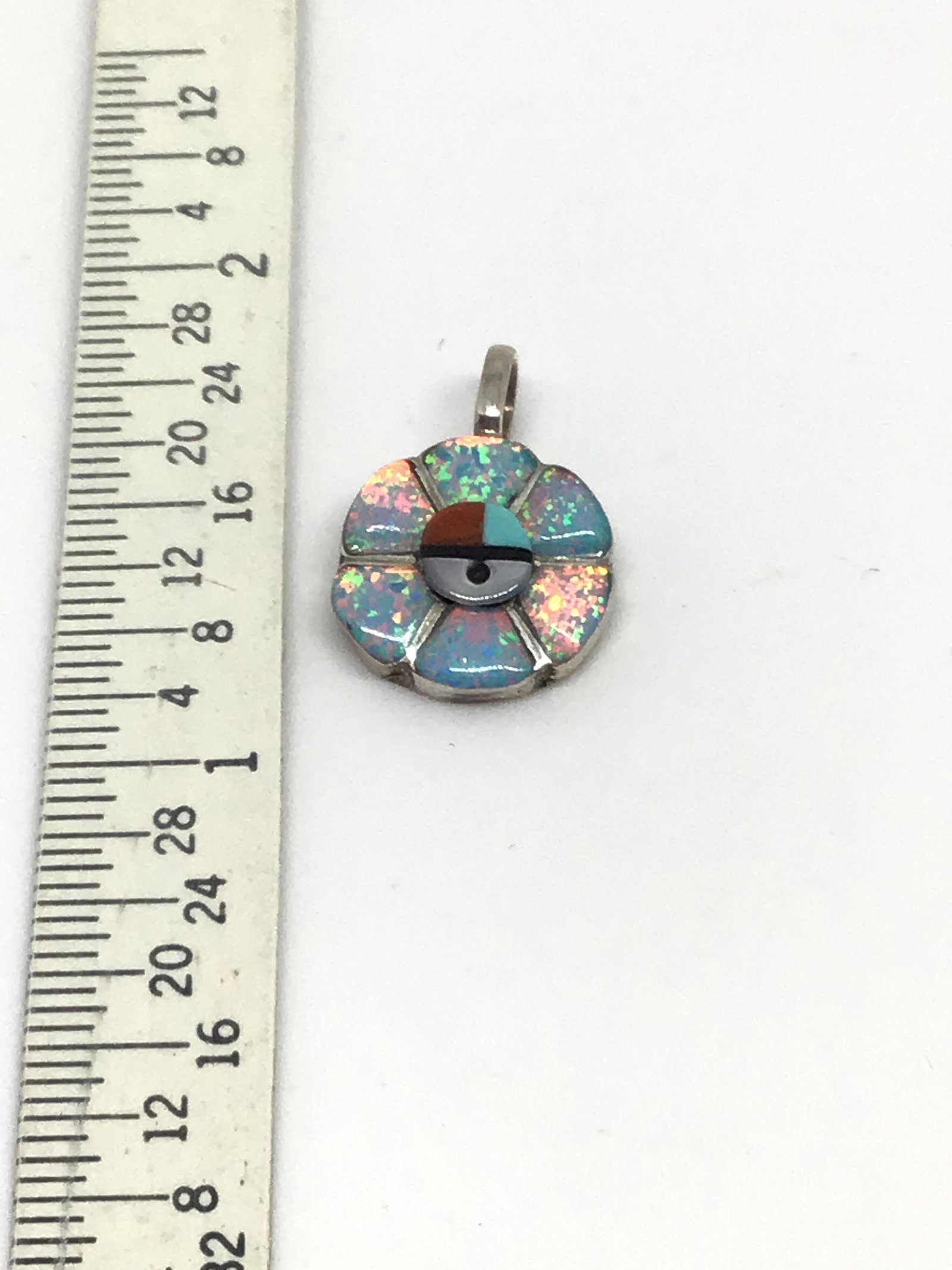 Multi-stone & Sterling Silver Sunface Pendant: Zuni handmade by Janice Lonjose