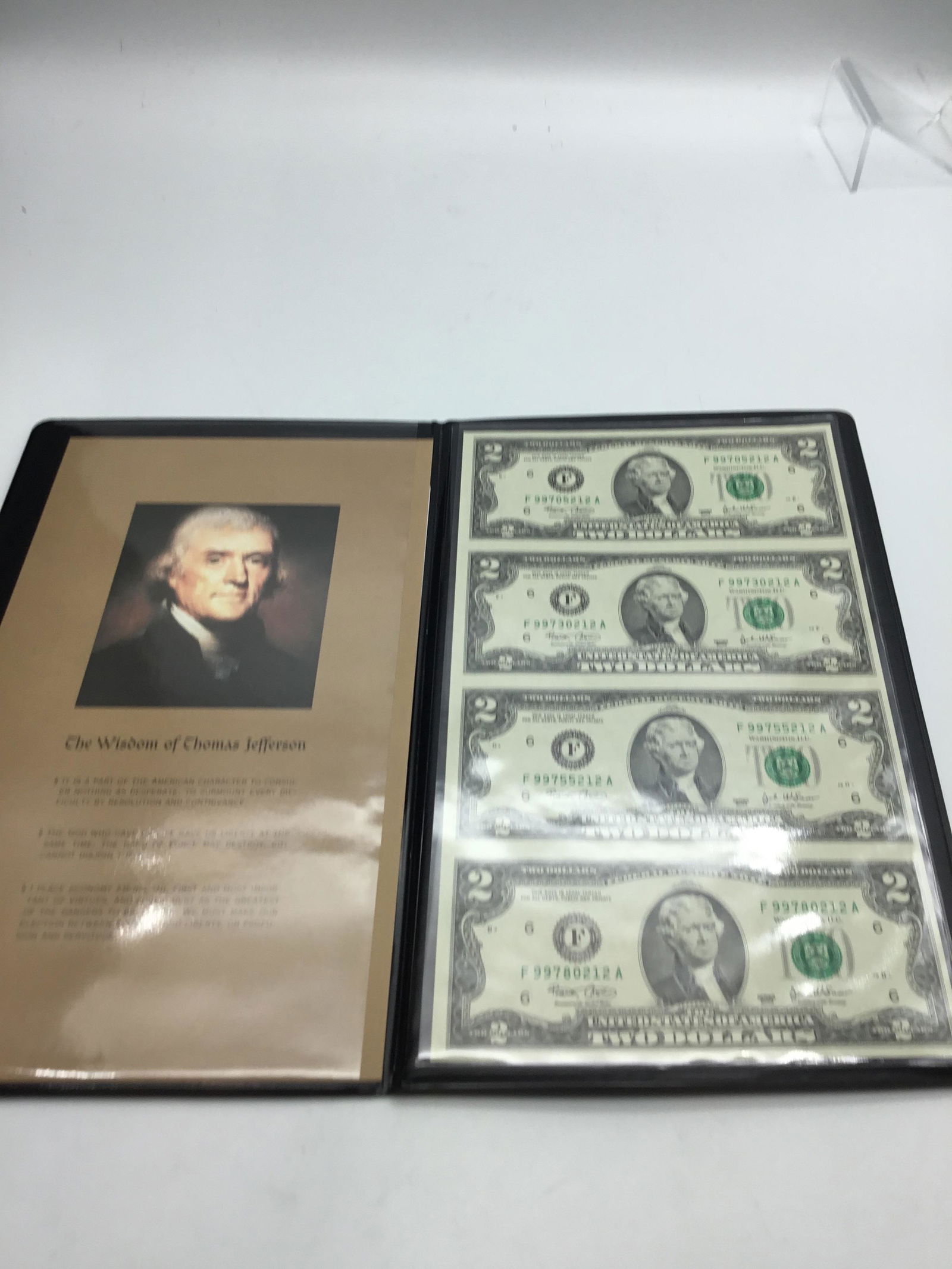 2003, four uncut two dollar bills: 2003, four uncut two dollar bills