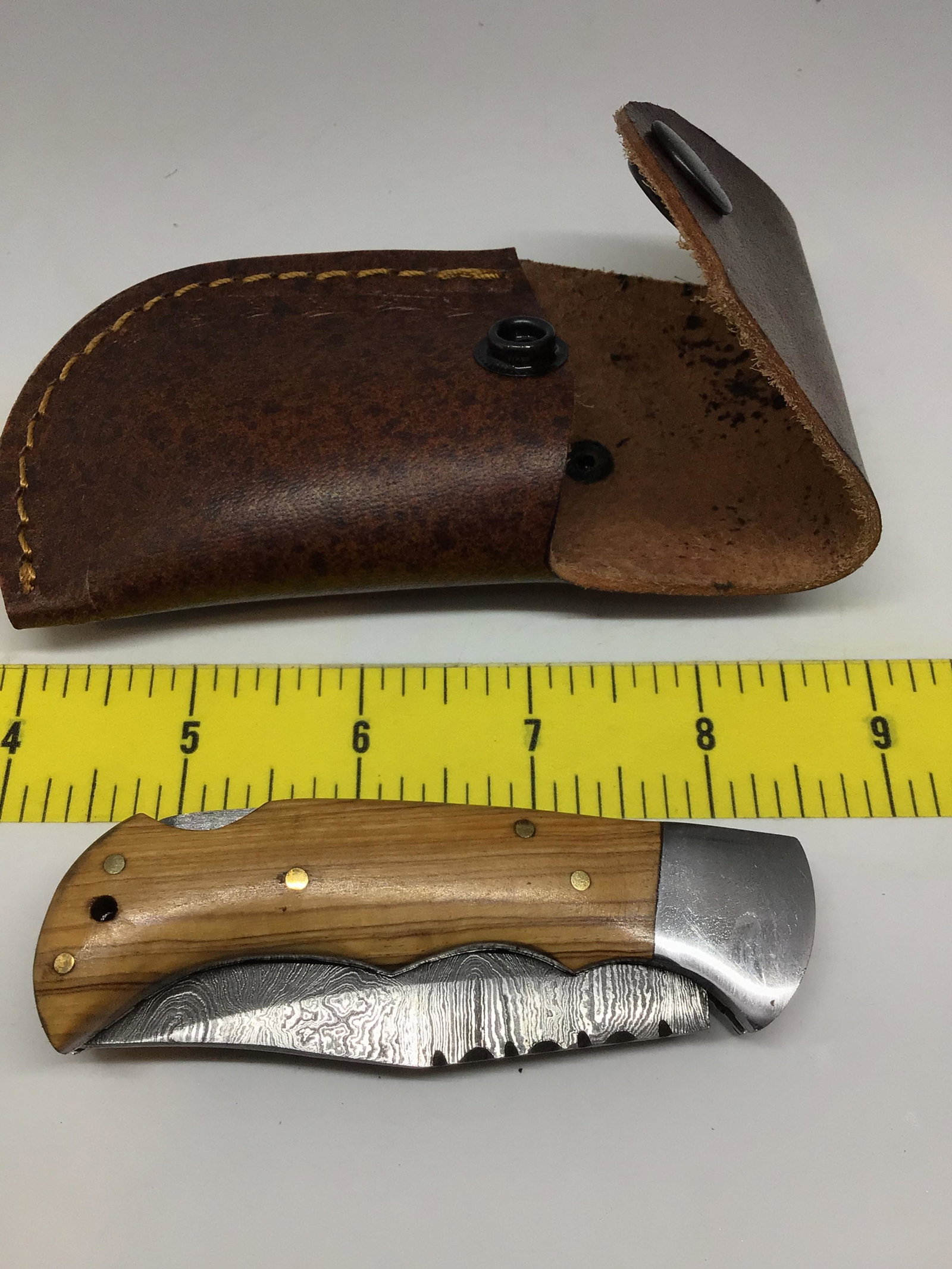 Damascus folding knife (1 of 3)