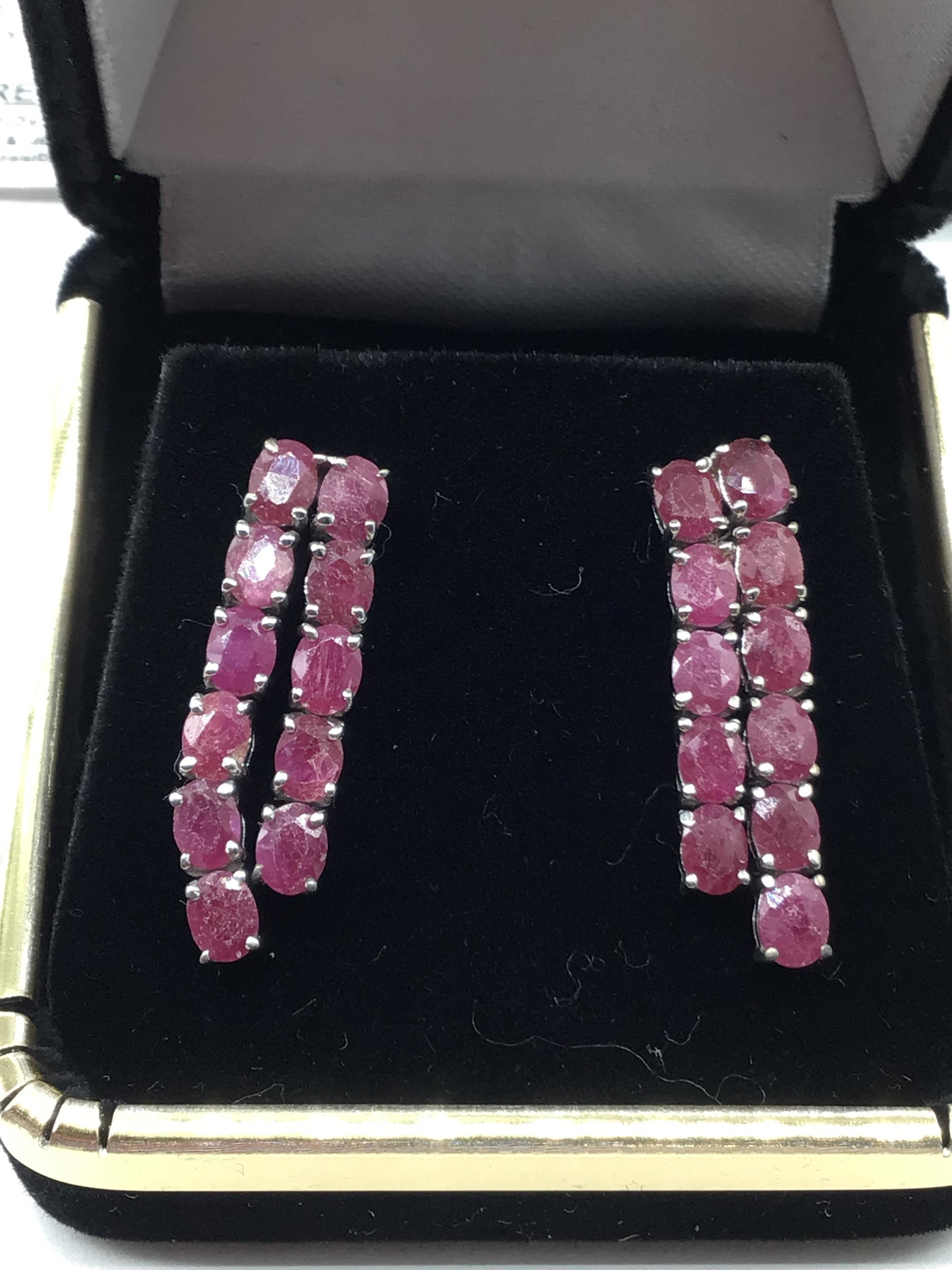 Platinum plate over sterling silver ruby earrings (1 of 2)