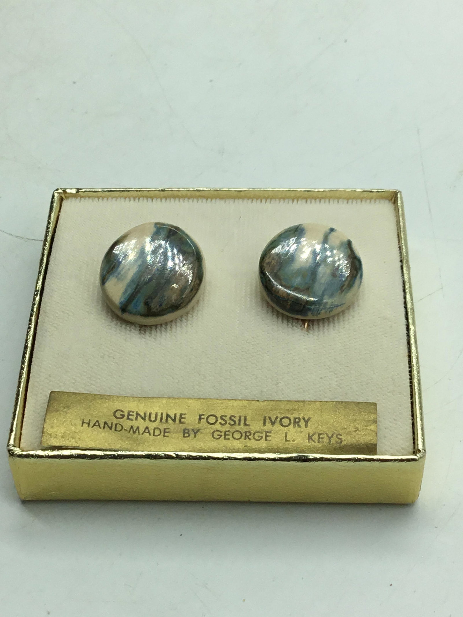 Fossil ivory cufflinks.: Fossil ivory cufflinks.