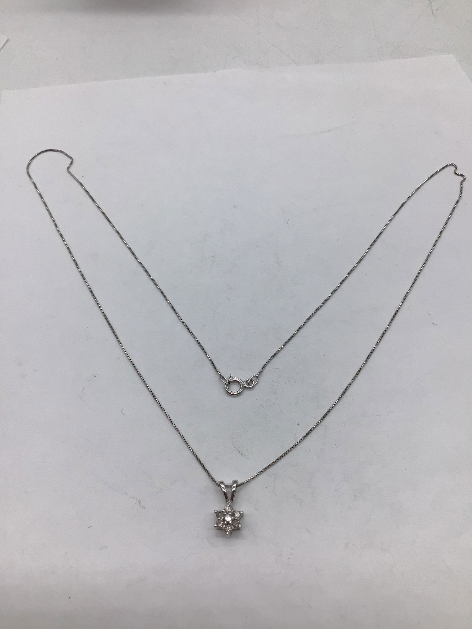 1.3 g 10k gold 18" chain and 7 Diamond pendant (1 of 2)